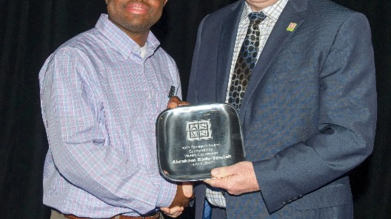 Badu-Tawiah accepting award